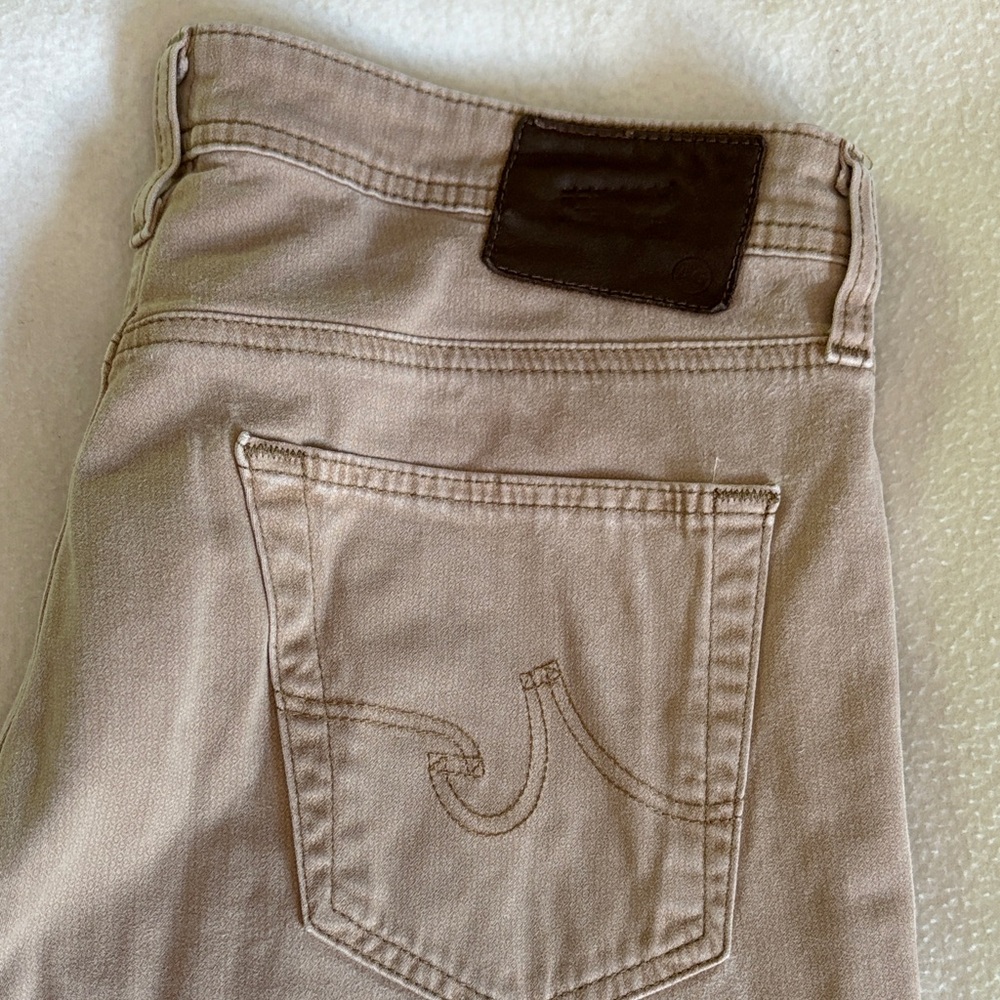 Classic Men's Beige Jeans with Contrast Leather Patch